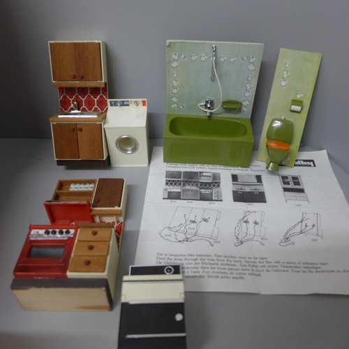 674 - A collection of Lundby of Sweden dolls house furniture