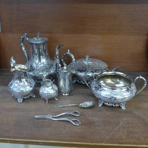 675 - A collection of silver plated items including a four piece tea service