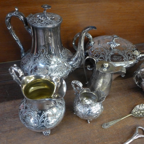 675 - A collection of silver plated items including a four piece tea service