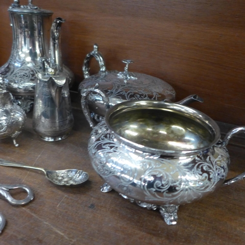 675 - A collection of silver plated items including a four piece tea service