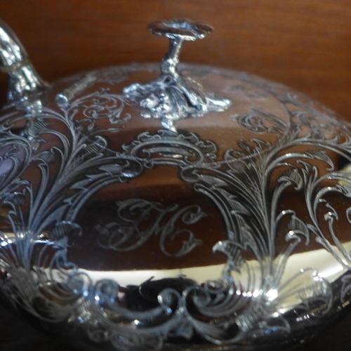 675 - A collection of silver plated items including a four piece tea service