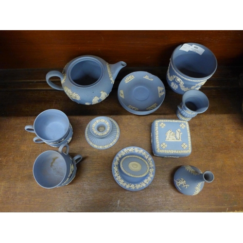 682 - Wedgwood jasperware porcelain, including four cups and saucers, teapot without lid, one saucer a/f