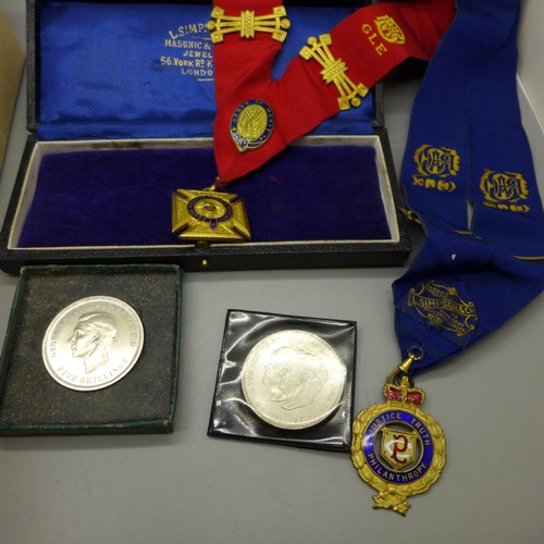 687 - A collection of coins, medallions and badges