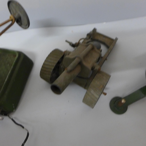 692 - An Astra Pharo Toy anti-aircraft field gun and a spotlight and one other die-cast field gun