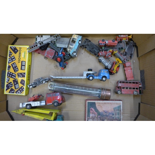 716 - A box of die-cast model vehicles, jigsaw puzzles and a dominoes set