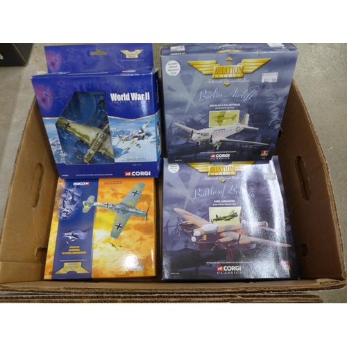 720 - Two boxes of die-cast model vehicles and aircraft, including four Corgi aircraft, model buses and ot... 