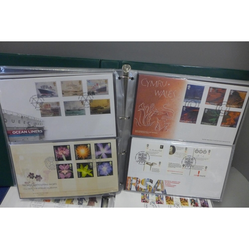 742 - Stamps: GB first day covers in two albums, 127 covers from the period 2002-2011, all typed address a... 