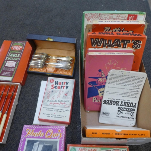 746 - A collection of vintage games, Christmas light bulbs, etc.