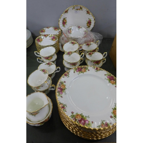 764 - A Royal Albert Old Country Roses twelve setting tea and dinner service with sandwich plates and bowl... 