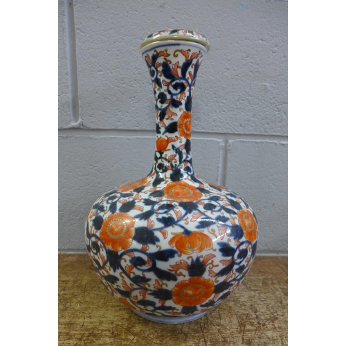 785 - An Imari vase and cover, cover with small chip, 36cm