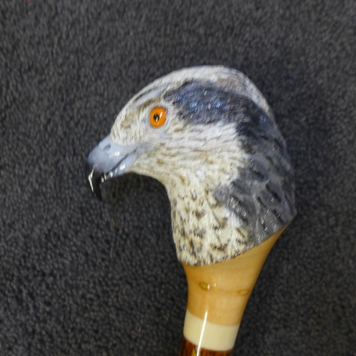 800 - A bird of prey's head walking cane with maker's stamp - CW