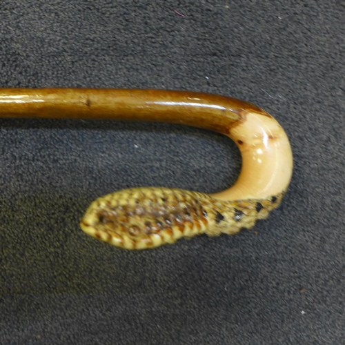 800a - A snake's head walking cane with maker's stamp - CW