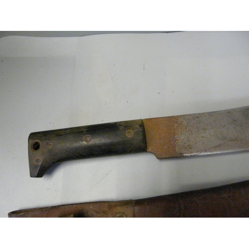 803 - A US issue machete and scabbard, dated 1945