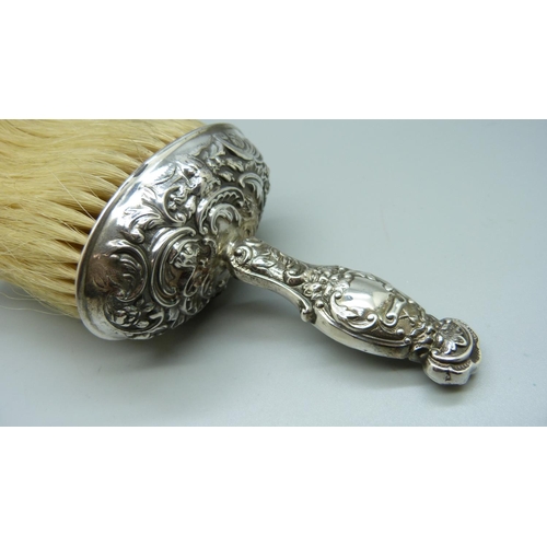 823 - A silver crumb brush, William Comyns, London 1903