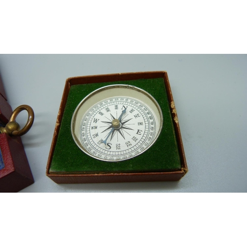 844 - A 19th Century pocket barometer, cased, and a later compass