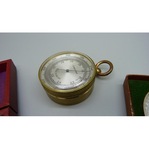 844 - A 19th Century pocket barometer, cased, and a later compass