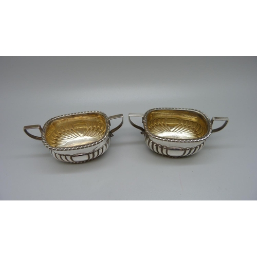 858 - A pair of silver salt cellars, Sheffield 1909, 126g