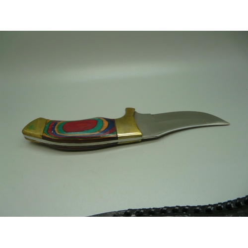 893 - A dagger with stained wooden handle and scabbard