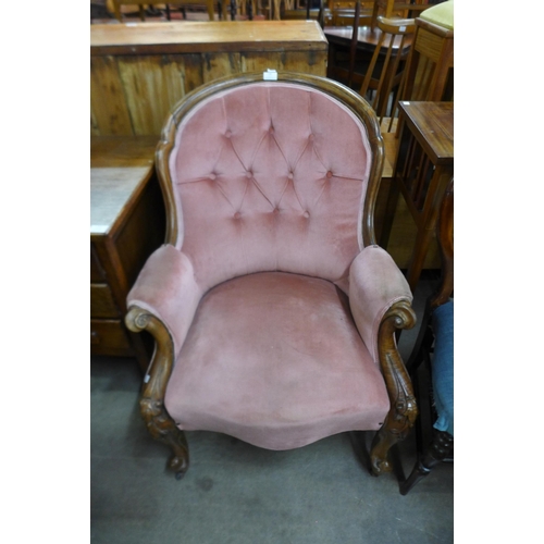 130 - A Victorian mahogany and fabric upholstered armchair