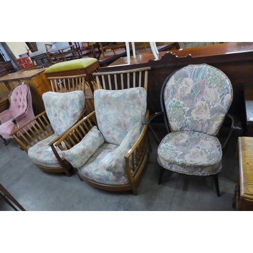 132 - A pair of Ercol Golden Dawn ash armchairs and one other