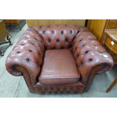 138 - A red leather Chesterfield club chair