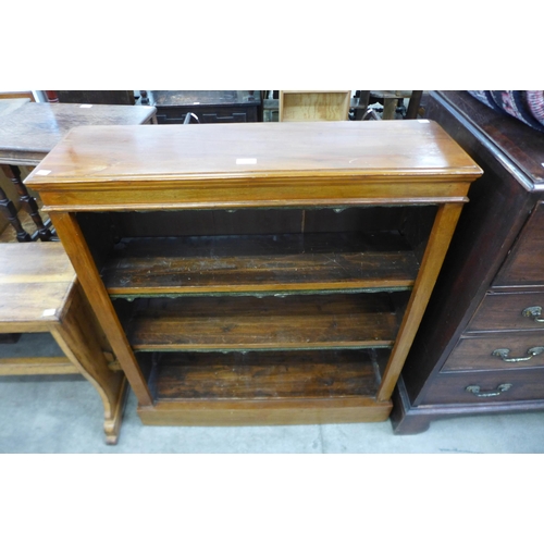 167 - A Victorian walnut open bookcase