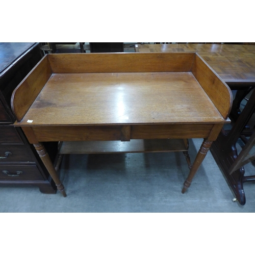 170 - A George IV mahogany two drawer writing table