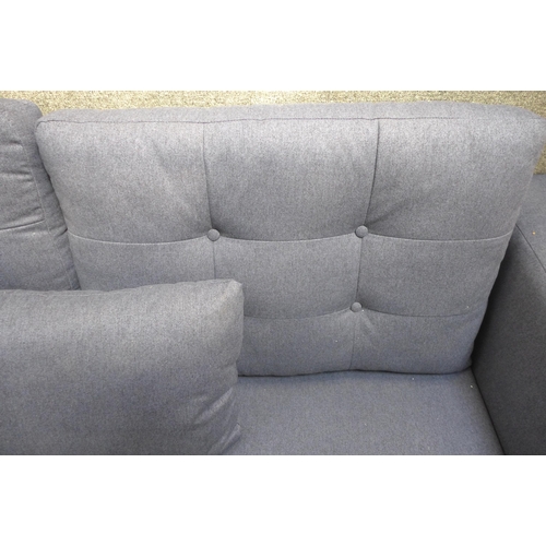 1401 - A blue upholstered two seater sofa