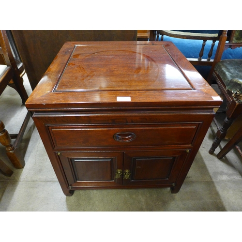 200 - A small Chinese hardwood cabinet