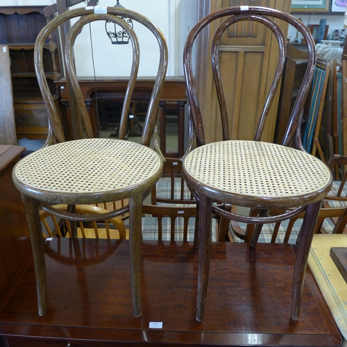 208 - A pair of beech bentwood chairs