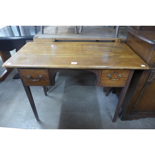 223 - A George III mahogany side table (later associated top)