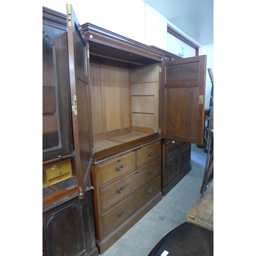 232 - A Victorian ash linen press (lacking interior slides)