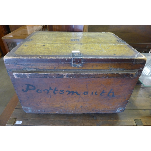 234 - A Victorian stained pine ships chest, inscribed Portsmouth