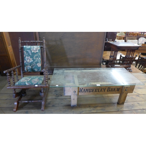 235 - A 19th Century American beech child's rocking chair and a glass topped Kimberley Brew coffee table