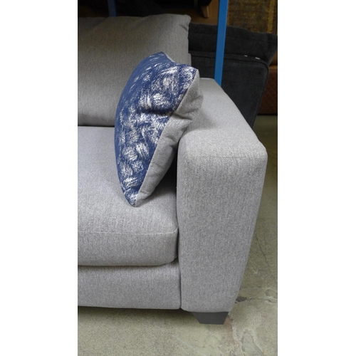 1406 - A grey upholstered three seater sofa