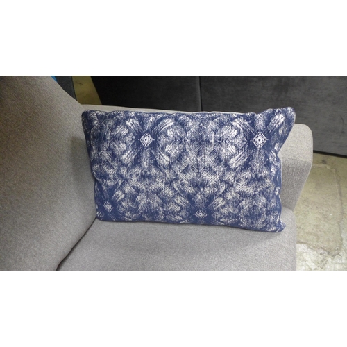 1406 - A grey upholstered three seater sofa