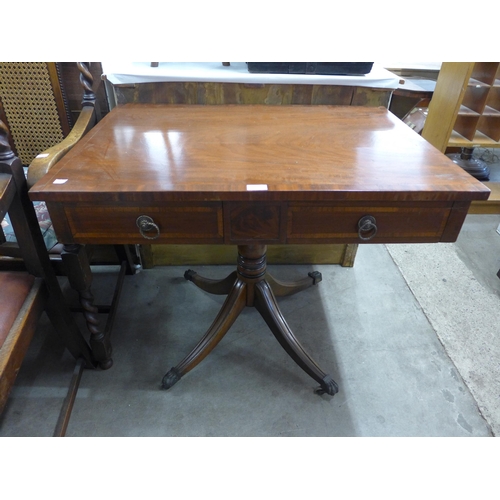 244 - A George IV mahogany two drawer library table