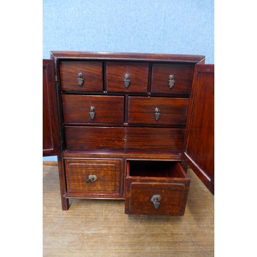 378 - A Japanese inlaid hardwood table top Kudansu cabinet, a/f