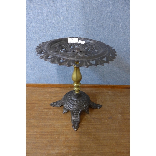 381 - A Victorian cast iron and brass comport