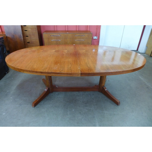 7 - An Archie Shine rosewood extending dining table, designed by Robert Heritage

*Accompanied by CITES ... 