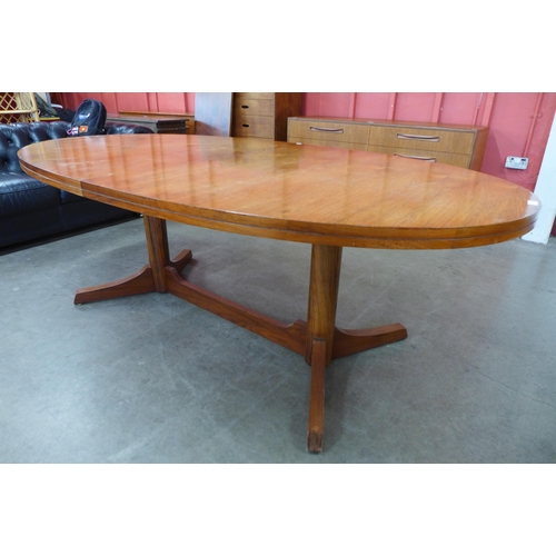 7 - An Archie Shine rosewood extending dining table, designed by Robert Heritage

*Accompanied by CITES ... 