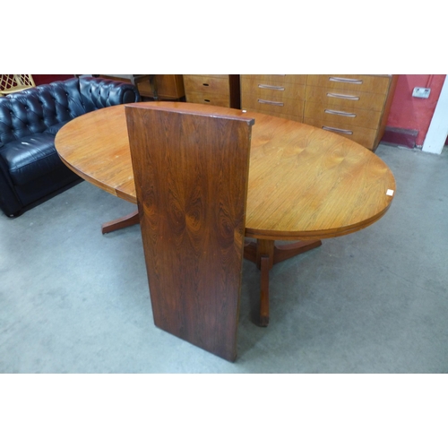 7 - An Archie Shine rosewood extending dining table, designed by Robert Heritage

*Accompanied by CITES ... 