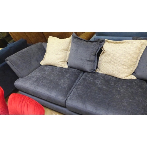 1375 - A large blue velvet corner sofa with reversible seat cushions