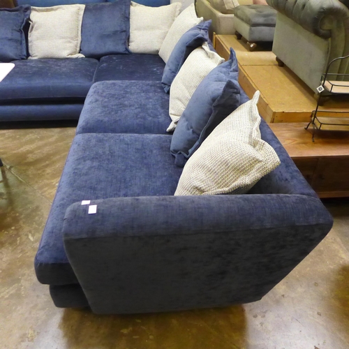 1375 - A large blue velvet corner sofa with reversible seat cushions