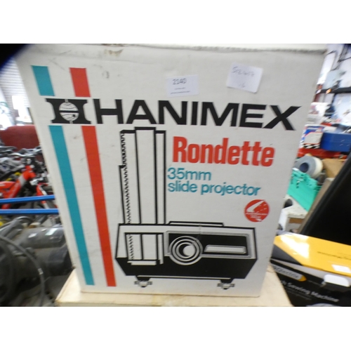 2140 - Bell & Howell Lumina 2 and Hanimex Rondette projectors with 6 slide carousels