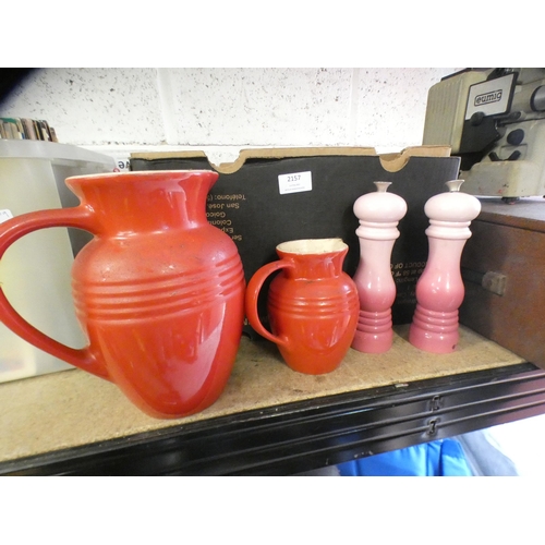 2157 - Quantity of Le Creuset Kitchen Items Incl: Jugs, Pans, Lids, Salt & Pepper Shakers A/F condition