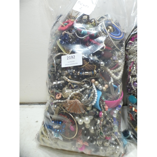 2192 - 2 Bags, approx. 5kg, of costume jewellery