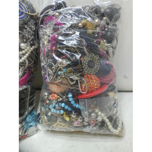 2192 - 2 Bags, approx. 5kg, of costume jewellery