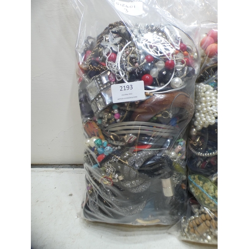 2193 - 2 Bags, approx. 5kg, of costume jewellery