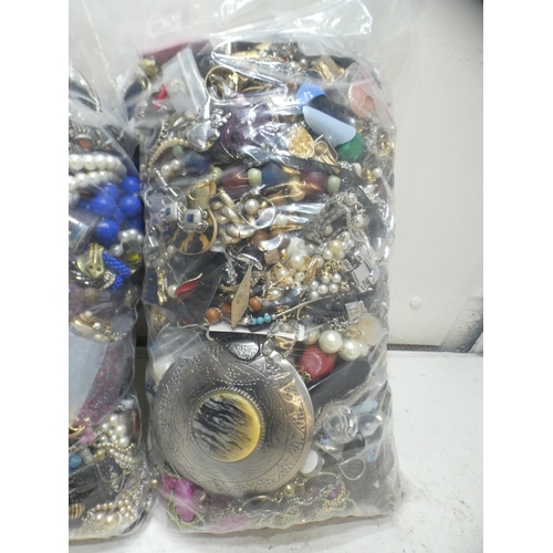 2194 - 2 Bags, approx. 5kg, of costume jewellery